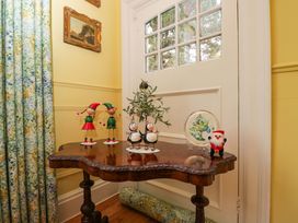 An entryway with a table and decorative items at White House