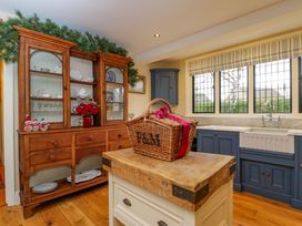 A kitchen with a wooden cupboard and sink at the White House