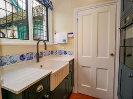 A kitchen with a sink and faucet at White House