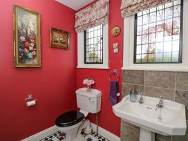 A bathroom with a toilet and sink at White House