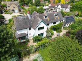 An aerial view of a house with garden and solar panels at White House