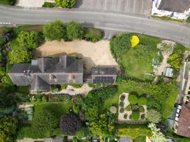 A house surrounded by garden and trees at White House