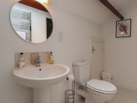 A bathroom with a sink and toilet at Razorbill in Flamborough