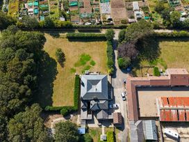 An aerial view showing a house and garden at Guillemot in Flamborough