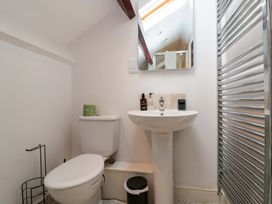 A bathroom with toilet and sink at Kittiwake in Flamborough