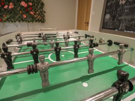 A foosball table with players at 13 Downside Close in Charmouth
