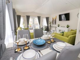 A dining room with a table set in The Haven 