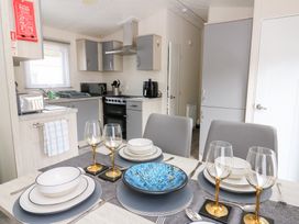 A dining room with table settings at The Haven