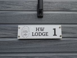 A sign indicating HW Lodge 1 at Heather William Lodge near Woodhall Spa
