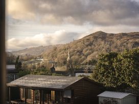 A view of mountains and trees with houses at Rydal Apartment Ambleside Ambleside