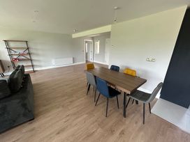 A dining area with a table and chairs at 30 River Run, Belturbet, County Cavan