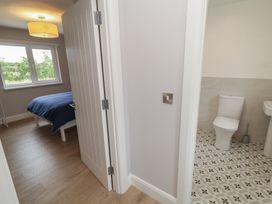 A bathroom with toilet and sink at 30 River Run, Belturbet, County Cavan