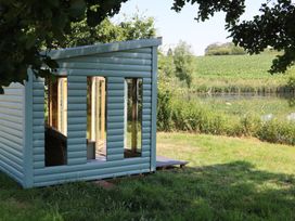 A cabin by the water at Holmside Audley Brow near Market Drayton