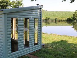 A cabin by a lake at Holmside Audley Brow near Market Drayton