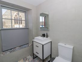 A bathroom with a sink and toilet at Island House in Aberaeron
