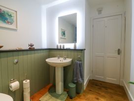 A bathroom with a sink and toilet at Ty Capel Bethania Nant Gwynant