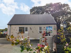 A building with a sign at Duffy Lodge, Kilmacloo near Creeslough, County Donegal