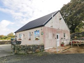 A building exterior with a sign at Duffy Lodge in Kilmacloo near Creeslough, County Donegal