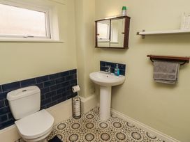 A bathroom with a sink and toilet at Flodden Apartment in Wooler
