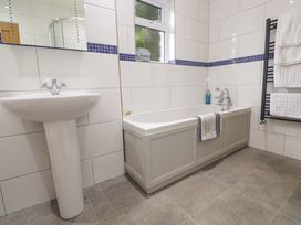 A bathroom with a sink and bathtub at Fair View St Just in Roseland near St Mawes