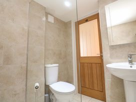 A bathroom with a toilet and sink at Fair View St Just in Roseland near St Mawes