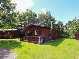 A log cabin view outside at The Red in Llanerch Park near St Asaph