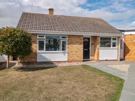 A house with a garden and pathway at No 8 Burnham-on-Sea