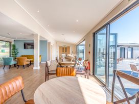 A dining area with tables and chairs at Lodge 67 at Riviera Bay Coastal Retreat Brixham
