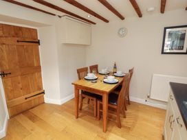 A dining room with table and chairs at Byways in Ambleside