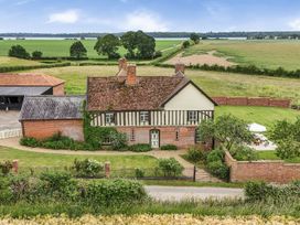 A house with garden and fields at Knights Farm in Harkstead