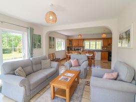 A living room with sofas and a coffee table at The Skating Rock in Bunane near Kenmare, County Kerry