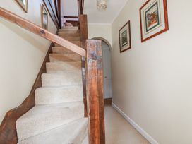 A staircase leading to upper levels at Temple House in Goonhavern