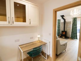 A study with a desk and a chair at The Barn in Astwood Bank