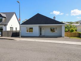 A house with a front door and windows at No 1 Lodge Wood in Kenmare, County Kerry