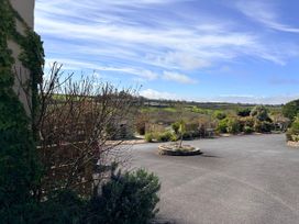 An outdoor area with garden and path at Lighthouse Cottage St Erme near Truro