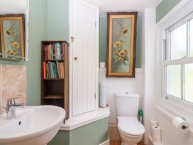 A bathroom with a sink and toilet at 5 Exe Street Topsham