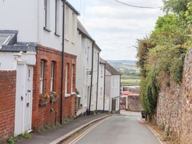 A street with residential houses and greenery at 5 Exe Street Topsham