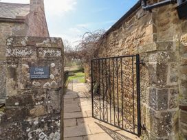 An entrance gate leading to the garden at Cragg Lodge in West Woodburn