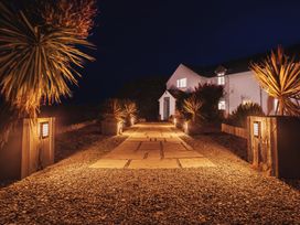 A pathway leading to a house at Glanllyn Bach in Llanfaelog