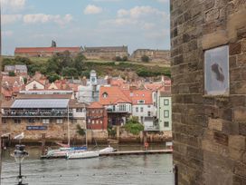 A view of buildings along the water at Jolly Roger in Whitby
