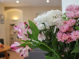 A bouquet of flowers in a dining room at Jolly Roger in Whitby