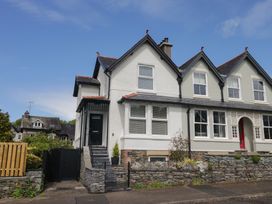 A house with a front door and windows at 5 Thornbarrow Road
