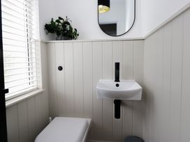 A bathroom with a sink and toilet at 5 Thornbarrow Road 