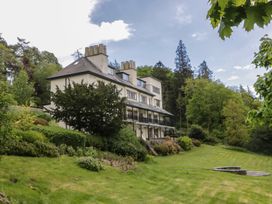 A house with a garden and balcony at Deer Wood At Applethwaite Hall Windermere