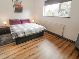 A bedroom with a bed and side tables at The Island's View in Gortahork, County Donegal