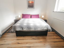 A bedroom with a double bed and nightstands at The Island's View, Gortahork, County Donegal
