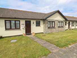 A house with a front door and windows at 14 Bosvigo, Ruan Major near Penhale