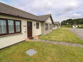 A house exterior with a door and windows at 14 Bosvigo in Ruan Major near Penhale