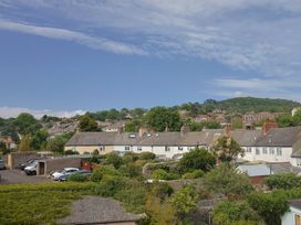 A view of houses and gardens at Wagtail Cottage in Lyme Regis