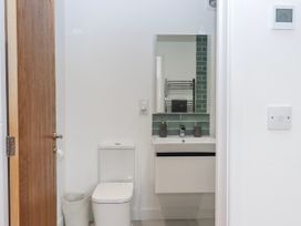 A bathroom with a sink and toilet at Lower Moorwood in Moorwood near Bovey Tracey